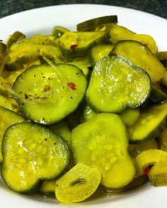 sliced cucumbers on a white plate ready to be eaten