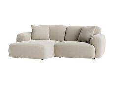 a white couch with two pillows on it and one arm facing the other way down