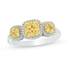 It will be love at first sight when you present this sparkling diamond ring. Crafted in 14K white gold, this three-stone design features cushion-shaped composites of yellow diamonds in yellow gold wrapped in individual frames of petite white diamonds in white gold. Radiant with 3/4 ct. t.w. of diamonds and a brilliant buffed luster, this anytime style is sure to be adored. This ring is available in size 7 only. Fine Jewelry Yellow Ring With Single Cut Diamonds, Yellow Diamond Ring With Pave Setting For Wedding, Luxury Three Stone Yellow Diamond Jewelry, Luxury Three Stone Diamond Yellow Jewelry, Three Stone Cluster Diamond Ring, Yellow Rings With Single Cut Diamonds For Anniversary, Yellow Single Cut Diamond Rings For Anniversary, Yellow Diamond Cluster Ring With Prong Setting, Yellow Diamond Ring With Pave Setting For Anniversary