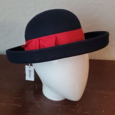 Betmar 100% Wool Navy Blue Hat With Red Ribbon Bowler Hat Round Crown Colors May Vary Based On Lighting Items Are Well Taken Care Of, But May Have A Loose Thread Or Hem. Don't Hesitate To Ask Any Questions, Ask For Measurements, Or Send An Offer! Not A Poshmark User? Use This Code When Signing Up To Purchase This, Or Any Of My Items. Https://Posh.Mk/Lhrqlgduzyb Blush Pink Fascinator, 20’s Style, Navy Blue Hat, Fluffy Bucket Hat, Purple Weave, Pink Fascinator, Elegant Hats, Black Snapback, Bowler Hat