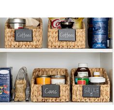 the shelves have baskets with labels on them that read coffee, cans and condiments