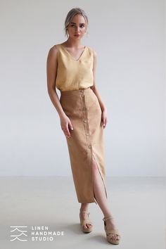 Button front linen skirt Cybile is a calf-length skirt with a front slit and asymmetrical fitted silhouette. Embrace simplicity and sophistication with our Linen Capsule Wardrobe—a curated collection of linen clothing designed to streamline your look with timeless pieces that are as versatile as they are stylish. Shop now! Button Down Maxi Skirt, Long Linen Skirt, Asymmetric Skirt, Skirt Patterns Sewing, Asymmetrical Skirt, Straight Skirt