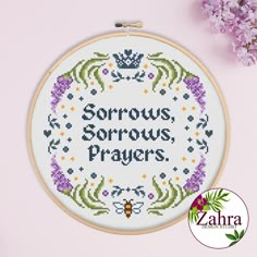 a cross - stitch pattern with the words serious serious prayer on it and some purple flowers