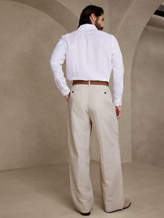 Effortlessly cool and expertly tailored, these relaxed puddle pants are crafted from a lightweight blend of luxurious linen and soft viscose for warm-weather appeal.  RELAXED FIT: Tailored for the at-ease fit of traditional trousers, but with the wid Formal Cotton Wide Leg Pants With Relaxed Fit, Classic Fitted Linen Chinos, Classic Wide Leg Pants For Formal Summer Events, Tailored Linen Wide Leg Pants For Business Casual, Elegant Summer Chinos, Elegant Spring Relaxed Fit Chinos, Elegant Relaxed Fit Spring Chinos, Elegant Relaxed Fit Chinos For Spring, Tailored Linen Long Pants