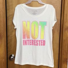 Nwot - Girls Size Xl Colorful Lettering “Not Interested” White T-Shirt. Cute Multicolor T-shirt With Slogan, Cute Multicolor Slogan T-shirt, Casual Multicolor Top With Slogan, Casual Multicolor Slogan Shirt, Colorful Lettering, Not Interested, White T Shirt, Girl Top, White Tshirt