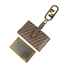 Used Fendi Mirror Holder Micro Ff Keychain 7as049 Leather Brown Bag Charm (Sku: Gzl13rcm) === General === Brand : Fendi Model : 7as049 Country Of Origin : Italy === Design === Type : Keyring Gender : Women Color : Brown Material : Leather === Size === Size (Hxwxd) : 14cm X 8cm / 5.51'' X 3.14'' === Included Items === Accessories : Box Accessories Notice : Before Purchasing, Please Refer To The Images Of The Accessories Included With The Item. === Condition === Condition : Opened (Never Used) Ranking : Rank Ns Never Used / Display Item Seller Ranking : Rank S Overall Scratches : Insignificant Condition Notice : Before Purchasing, Please Refer To The Images For The Exact Condition O Fendi Phone Pouch, Luxury Wallet With Interior Key Chain Holder, Fendi Keychain, Fendi Purse Strap, Fendi Accessories, Fendi Wallet, Brown Leather Bag, Brown Bags, Woman Colour