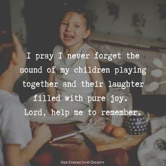 two children sitting at a table talking to each other with the words, i pray i never forget the sound of my children playing together and their laughter