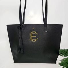 Modern Interlocking Monogrammed Tote Bag - Black – SewingSeams Everyday Black Embroidered Bag, Black Embroidered Shopping Bag, Black Embroidered Double Handle Bag, Black Embroidered Tote Shoulder Bag, Gold Tote Gift Bag, Gold Double Handle Shoulder Bag For Gift, Gold Double Handle Shoulder Bag As Gift, Gold Double Handle Shoulder Bag Gift, Luxury Black Monogrammed Bags