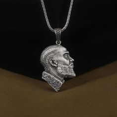 Realistic 3D Nipsey Hussle Icon Necklace, Memorial Rapper Pendant in 925 Sterling Silver,  Rapper Mens Gift, Hip Hop Necklace, Unique Gift  ✅ Beautifully crafted pendant  ✅ High-quality materials for durability  ✅ Detailed and intricate design pendant necklace  ✅ Makes a thoughtful gift for someone special    ★Item Details  * Gender: Male / Female  * Material: 925 Sterling Silver  * Finish: Oxidized / Polished / Gold Plated  * Pendant Weight:  * Pendant Diameter:  * Bail with: Suitable for up to Sterling Silver Pendant Necklace For Streetwear, Silver Sterling Silver Jewelry For Streetwear, Silver Curb Chain Jewelry For Father's Day, Father's Day Silver Curb Chain Jewelry, Hip Hop Necklace, Nipsey Hussle, Necklace Unique, Intricate Design, Mens Gifts