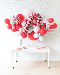 christmas-balloon-backdrop-garland Backdrop Garland, Giant Candy Cane, Holiday Balloons, Giant Candy, Christmas Props, Candyland Christmas, Pink Xmas, Kids Christmas Party