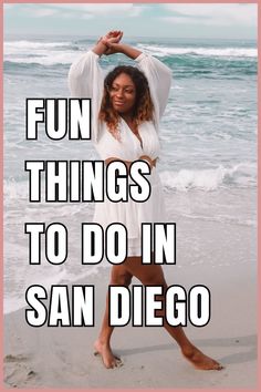 a woman standing on top of a beach next to the ocean with text overlay that reads fun things to do in san diego