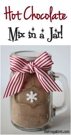 hot chocolate mix in a jar with red and white striped bow on the top, text overlay reads hot chocolate mix in a jar