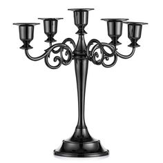 a black candelabra with five lights on it's sides and an ornate design