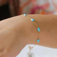 "Natural Turquoise Gemstone Bracelet, 18k Gold Bracelet, Gold Jewelry Bracelet, Gold Jewelry Bracelet, Turquoise Gemstone, Birthday Gifts  GEMSTONE DETAILS  ✦ Gemstone : Turquoise ✦ Gemstone Type : Natural ✦ Gemstone Shape : Oval ✦ Gemstone Color : Blue ✦ Gemstone Cut : Plain ✦ Number of Gemstones : 1 ✦ Gemstone Grade : Excellent ✦ Gemstone Weight : 0.55 CT METAL DETAILS  ✦ Metal : 18K Gold ✦ Metal Color : Yellow Gold/White Gold/Rose Gold ✦ Bracelet Size : 7.5\" ✦ Bracelet Weight : 1.4 Gram ✦ Bracelet Box: Yes CUSTOMISATION DETAILS  We can customize any piece of fine jewelry. You can simply message us on Etsy or drop a text at +91-7357229656 (WhatsApp/iMessage) to let us know about all the customization you want. Customization can include  ✦ The Gemstone: This ring can be made in Emerald, Dainty Turquoise Gemstone Bracelets, Fine Jewelry Turquoise Gemstone Bracelet, Turquoise Fine Jewelry Bracelets For Gift, Gold Jewelry Bracelet, 18k Gold Bracelet, Bracelet Box, Jewelry Bracelets Gold, Rose Gold Bracelet, Jewelry Bracelet