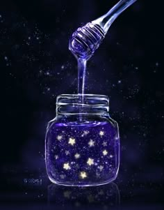 a glass jar filled with liquid and stars