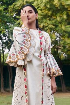 Shop for Chandrima White Kala Cotton Cutwork Long Jacket for Women Online at Aza Fashions Long Jacket Style, Sleeveless Long Jacket, Long Shrug, Long Jackets For Women, Ivory Fabric, International Style, Sleeveless Jacket, Long Jacket, Tiered Maxi Dress