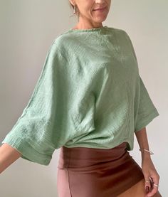 Natural cotton summer top in soft mint color  Very loose fit with wide kimono sleeve MEAESURE Size S/M MATERIAL * cotton  NOTE This blouse is oversized, with the very small neckline  Thank You for looking Oversized Batwing Sleeve Tops For Vacation, Versatile Flowy Tops For Loungewear, Solid Color Summer Tunic Top, Bohemian Style Relaxed Fit Tops, Bohemian Relaxed Fit Top, Spring Loungewear Tops With Kimono Sleeves, Flowy Batwing Sleeve Top For Day Out, Bohemian Short Sleeve Tops For Loungewear, Flowy Short Sleeve Tops For Loungewear