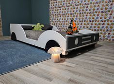 a child's bed with an unusual design