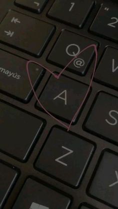 a keyboard with a heart drawn on it