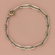 silver plated 4mm ring & connector chain bracelet size 6in Pre-loved but in great condition - Weight - 2.7g Size - 6in Width - 4mm Item ID - ABI45900224 Classic Silver Link Charm Bracelet, Silver Chain Link Charm Bracelet, Dainty Metal Link Charm Bracelet, Everyday Vintage Link Bracelets, Nickel-free Classic Link Bracelets, Nickel Free Link Bracelets Classic Style, Nickel-free Link Bracelets In Classic Style, Dainty Silver Link Charm Bracelet, Vintage Link Bracelet With Silver Chain