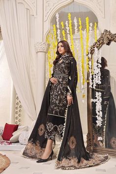 SHIRT STYLE: Mock neck long front open Shirt FABRIC: Gold Zari Front fully embroidered, Embellished neckline of shirt with embroidered sleeves and back. Color: Black TROUSER Embellished Silk Grip Trouser Color: Black DUPATTA Embellished Organza Dupatta Luxury Suit, Black Dupatta, Chiffon Suit, Open Shirt, Printed Dupatta, Embroidered Chiffon