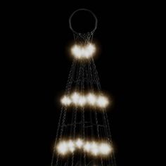 a christmas tree made out of lights in the dark