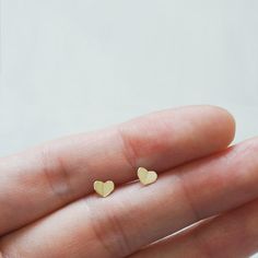 Include  :  1 pair of studs earrings & gold-backs(select option) / black paper packageMaterial : 10K solid Gold (not plating)Folded Heart measures approx. 4.7 x 3.9 mmLength / thickness of Post  :  9 mm / 0.6 mmdiameter of backs  :  3mm(solid gold backs) / 5.5mm(covered gold backs)* If you want to purchase a single earring, see the below.https://www.etsy.com/listing/262561856/single-order-10k-gold-stud-earrings?ref=shop_home_active_1 Tiny Gold Heart Earrings For Gifts, Minimalist Rose Gold Heart Earrings Gift, Folded Heart, Types Of Gold, Geometric Studs, Heart Stud Earrings, Studs Earrings, Gold Stud, Heart Studs