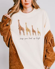 Giraffe Tee, Comfort Colors, Choose Kindness Shirt, Trending Right Now, Women's Graphic T-Shirt, Love Te, Grow Positive Thoughts Tee, Bohemian Style * This is a normal Unisex size Comfort Colors T- Shirt. * For an oversized tee, please size up 1-2 sizes based off your measurements on the size chart provided. * If you are wanting an oversized "Sleep shirt/Dress shirt" look, we recommend sizing up 3 sizes. * Please review the size chart to ensure you receive the fit you want.  ABOUT THIS Comfort C Grow Positive Thoughts, Sleep Shirt Dress, Kindness Shirt, Choose Kindness, Kindness Shirts, Sleep Shirt, Boho Stil, Oversized Tee, Positive Thoughts