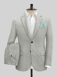 Impress everyone with our Italian Empire Gray Tweed suit that is sure to create a statement outfit to look absolutely amazing. Crafted from wool, the suit will make you want to dress up for all occasions like weddings, parties, or to work of your choice. 
 
 Look features a 2 button jacket with notch lapels, horn royal black buttons, single vent, two cuff buttons and two welted back pockets on trousers.  You can change the look during customization if required. 
 
 Lining: Viscose; Dry Clean. Fitted White Tweed Blazer, Elegant Fitted Tweed Blazer, Elegant White Tweed Jacket For Business, Elegant Tailored Tweed Blazer, Formal Tweed Suit With Suit Collar, Elegant Tweed Suits For Winter, Wool Tweed Jacket With Suit Collar For Wedding, White Wool Suit For Work, Tailored Tweed Suits For Business Casual