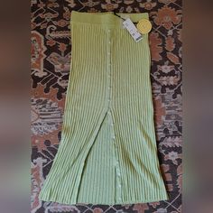 Urban Outfitters Sweater Skirt New With Tags Beautiful Pale Lime Green High Waist Midi Skirt , With Buttons Running Down The Front Never Worn Marked As A Size L Offers Are Welcome Green Knee-length Bottoms For Day Out, Knee-length Green Bottoms For Day Out, Green Stretch Maxi Skirt For Spring, Trendy Pencil Maxi Skirt For Spring, Trendy Spring Pencil Maxi Skirt, Green Midi-length Bottoms For Summer, Green Midi Length Bottoms For Summer, Green Midi-length Summer Bottoms, Green Midi Length Bottoms For Day Out