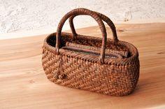 a basket sitting on top of a wooden table