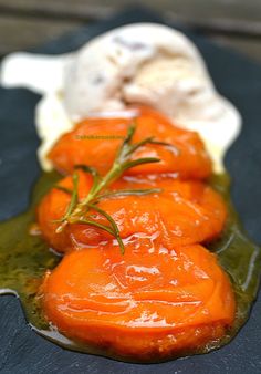 some carrots are sitting on a green plate