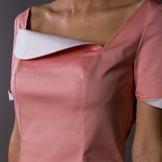 "A beautiful pink dress featuring a fit and flare silhouette, mini length, and asymmetrical neckline with white collar. - asymmetricak neckline with white collar , - fit and flare silhouette - mini length - short sleeves with white cuffs - concealed back zipper closure Color: pink Fiber: cotton - 95% , 5% elastane For Size S (US 8): dress length - 33,5\" / 85 cm Our model wears size S (US 8) and is 171cm/5'6\" tall. You may feel free choosing the size. Just send us your measurements (bust, waist Pink Square Neck Mini Dress For Formal Occasions, Pink Square Neck Mini Dress For Formal Events, Pink Mini Dress With Fitted Bodice For Formal Occasions, Pink Mini Dress With Fitted Bodice And Short Sleeves, Feminine Fitted Asymmetrical Mini Dress, Formal Pink Mini Dress With Short Sleeves, Pink Mini Dress With Fitted Bodice And Square Neck, Pink A-line Fitted Mini Dress, Pink Sleeveless Fit And Flare Dress