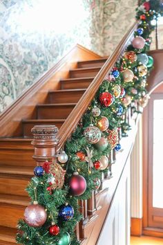 christmas decorations on the banisters and stairs