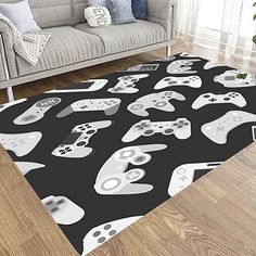 a living room area rug with video game controllers on it