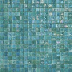 a blue tile wall that is made up of many different shades of green and white