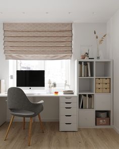 a white desk with a computer on top of it next to a chair and bookcase