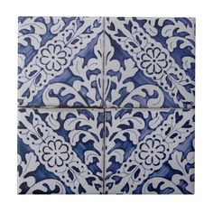 blue and white tiles with floral designs