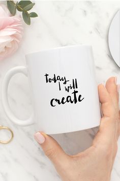 a woman holding a coffee mug with the words today i will create printed on it