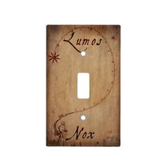 a light switch cover with the words lumos and nox on it's side