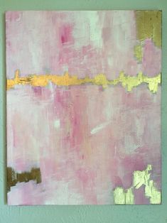 an abstract painting with gold and pink colors