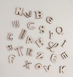 the letters are made out of wood and have different shapes