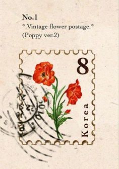 a postage stamp with flowers on it and the number eight written in black ink,