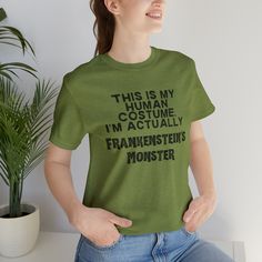 This is my human costume, I'm actually Frankenstein's Monster Tee, Funny Halloween shirt This classic unisex jersey short sleeve tee fits like a well-loved favorite. Soft cotton and quality print make users fall in love with it over and over again. These t-shirts have-ribbed knit collars to bolster shaping. The shoulders are tapered for a better fit over time. Dual side seams hold the garment's shape for longer.  .: 100% Airlume combed and ringspun cotton (fiber content may vary for different colors) .: Light fabric (4.2 oz/yd² (142 g/m .: Retail fit .: Tear away label .: Runs true to size Frankenstein's Monster, Frankenstein, Halloween Funny, Halloween Shirt, Light Fabric, Print Making, Short Sleeve Tee, Print Quality, Gender Neutral