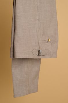 A bespoke suit crafted from a beautiful lighweight "triple-blend" fabric comprised of wool, linen and silk. The wool gives it lasting performance and smooth drape, the linen gives it texture and breathability, and the silk gives it a unique luster with a subtle iridescent sheen unlike any other fabric. Fitted Linen Suits With Pressed Crease, Fitted Linen Suit With Pressed Crease, Fitted Linen Suits With Welt Pockets, Fitted Linen Suit With Welt Pockets, Linen Double Breasted Suit With Suit Collar For Work, Linen Double Breasted Suit With Notch Lapel For Workwear, Classic Linen Suit With Concealed Placket, Semi-formal Linen Double Breasted Suit With Welt Pockets, Linen Double Breasted Suit For Work