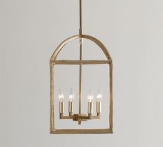 a chandelier with four candles hanging from it