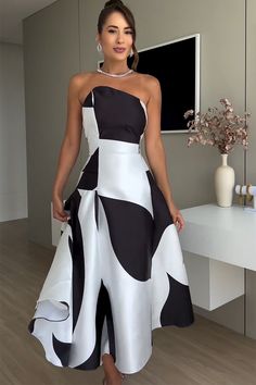 DESCRIPTION: Colorblock design Strapless and A-line design Midi length Fabric: polyester Model is wearing size small. Product Measurements  Length  Waist   Label Size  US Size  IN  IN   XS  2  37.40  35.04   S  4  37.80  36.61   M  6  38.19  38.19   L  8 -10  38.58  40.55      Product Measurements  Length  Waist   Label Size  US Size  CM  CM   XS  2  95  89   S  4  96  93   M  6  97  97   L  8 -10  98  103 Black A-line Strapless Dress For Prom, Black A-line Strapless Dress For Spring, Black A-line Maxi Dress For Party, Black A-line Strapless Dress For Cocktail, Black A-line Strapless Dress, Black A-line Strapless Evening Dress, Black A-line Strapless Cocktail Dress, Black Strapless A-line Cocktail Dress, Black Strapless Midi Dress For Prom