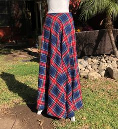 "I love these 70s floor length skirts so flattering with the small waist and the full sweep. Side button and zipper great tartan plaid of blue, black, red, green, white and yellow. Dress it up or down boots or heels. Great for the Holidays. I see only minor wear. I'm unsure if it's wool or acrylic. Label: Sears made in the USA Measurements Waist: 28\" Length from back of waist to hem: 41.5\" Sweep: 79\" All these measurements are approximate. Please understand this skirt is 40 to 50 years old an Cotton Full-length Maxi Skirt For Fall, Fall Full-length Cotton Maxi Skirt, Plaid Full Skirt With Lining, White And Yellow Dress, Yellow Tartan Skirt, Floor Length Skirts, Retro Plaid Lined Skirt Bottoms, Retro Full Plaid Skirt, Vintage Plaid Full Skirt