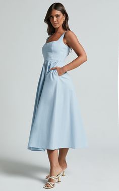 Cotton Sundress With Fitted Bodice For Spring, Spring Cotton Sundress With Fitted Bodice, Cotton A-line Midi Dress For Garden Party, Summer Cotton Midi Dress With Fitted Bodice, Light Blue Knee-length Cotton Dress, Blue A-line Linen Midi Dress, Elegant Cotton Sundress With Square Neck, Cotton A-line Unlined Dress, Cotton A-line Dress Unlined