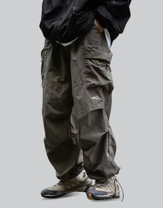 Green Parachute Pants Green Parachute Pants, Baggy Parachute Pants, Techwear Jacket, Techwear Pants, Techwear Streetwear, Futuristic Aesthetic, Black Combat Boots, Baggy Clothes, Chest Rig